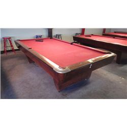 Brunswick medalist professional 4 1/2 x 9 ft slate regulation 8 ball/9 ball table with ball return. 