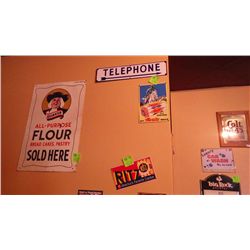 Three metal signs Telephone, Merita bread, and Ritz cracker