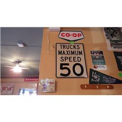 Three signs "Trucks max speed 50", Co-Op metal sign and "Tooner Ville Trolly mechanical Tin Toy meta