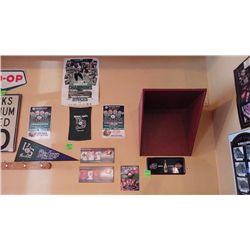 3 Husky memoribilia banners, 2 Husky posters, 2 plaques of Canada hockey jerseys and genuine classic