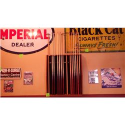 Pool cue rack with 12 pool cues and 2 rests