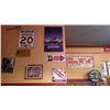 Image 1 : Huck Finn movie poster, Coca Cola sold here metal sign and Labatt Lite metal sign
