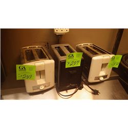 Three two slice toasters