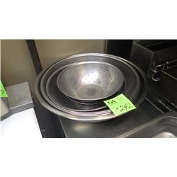 8 stainless steel bowls and colander