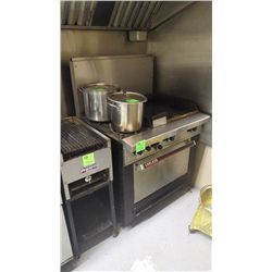 Garland two burner range with flat top grill and oven. Natural gas