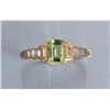 Image 1 : One  14k yellow gold ring set with an emerald cut  peridot and citrine baguettes.  Est.:  $200-$250.