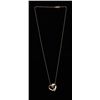Image 1 : One 14k yellow gold heart shaped slider pendant  set with a 0.40ct diamond and 6 side diamonds  weig