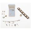 Image 1 : Lot of antique jewelry including one stick pin  with a green stone; one charm bracelet with some  of