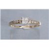 Image 1 : One 14k yellow gold ring set with approx 4  princess cut diamonds weighing approx 0.30 cts.   Est.: