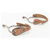 Image 2 : Unmarked pair of twisted iron spurs with small  rowels, leather straps in overall good condition.