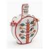 Image 2 : Leather covered glass flask, multi-colored  decorative artwork style, approx. 8” in height.    Est.: