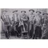 Image 2 : Framed copy of a photo showing six cowboys posing  for what may be a family portrait with Pa in the