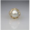 Image 1 : Sophisticated South Sea 12.00 mm Pearl and Diamond  Ring beautifully made with 16 round and baguette