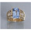 Image 1 : One exceptional cornflower blue emerald cut  sapphire weighing approx 7ct in a 14k YG setting  and 4