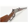 Image 14 : Winchester Model 1886 lever action rifle in .38-56  caliber showing 26” octagon barrel, full  magazi