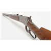 Image 15 : Winchester Model 1886 lever action rifle in .38-56  caliber showing 26” octagon barrel, full  magazi