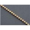 Image 2 : Diamond bracelet with 31 diamonds, 3-1/2 ct +  in  14K.   Est.:  $2,500-$5,000.
