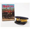 Image 1 : Royal Canadian Mounted Police visor cap in fine  condition with hardback book “The Mounties: by Jim