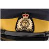 Image 2 : Royal Canadian Mounted Police visor cap in fine  condition with hardback book “The Mounties: by Jim