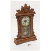 Image 1 : Seth Thomas oak mantle clock with alarm, Eastlake  style, approx. 23” in height, in very good  condi