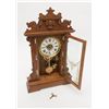 Image 3 : Seth Thomas oak mantle clock with alarm, Eastlake  style, approx. 23” in height, in very good  condi