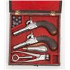 Image 1 : Pair of English muff pistols in original Moroccan  leather case with embossed decoration, flask,  mo