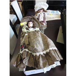 2 Collector dolls on stands