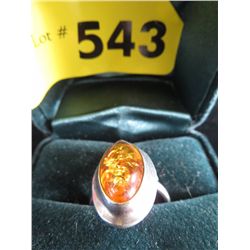 Amber ring set in sterling silver
