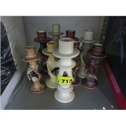 Nine soapstone candle sticks