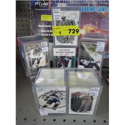 9 boxes of sports trading cards