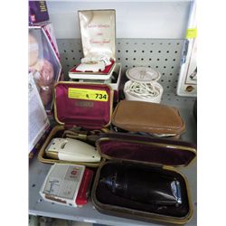 9 Vintage electric razors.