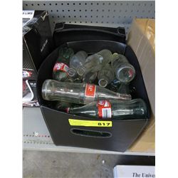 Tote of glass soda bottles