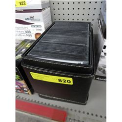 Approx. 65 DVDs in storage container