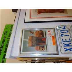 Framed Coca Cola advertising