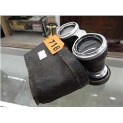 Vintage binoculars in leather case