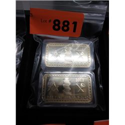 2  Gold clad art bars