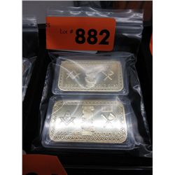 2  Gold clad art bars