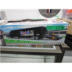 Battery operated Mobil 1 Racing toy car carrier