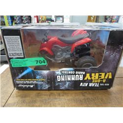 R/C ATV, open box.