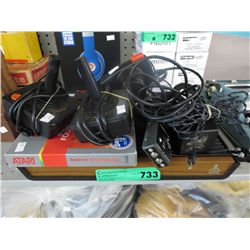 Vintage Atari game console with controllers