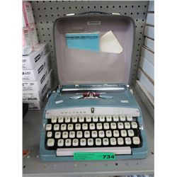 Vintage Brother Valiant portable typewriter - blue