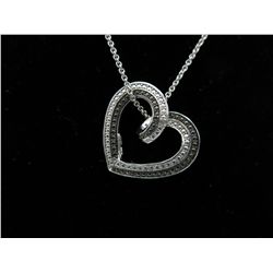 Reversible black & white diamond heart necklace