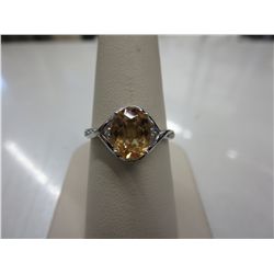 Citrine & diamond dinner ring set in silver