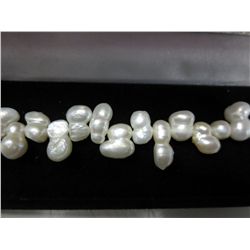 Hand knotted white freshwater pearl bracelet