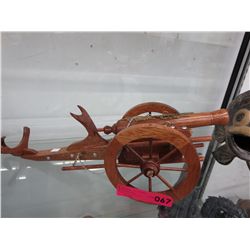 Wood cannon shaped wine bottle holder