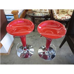 2 Red swivel stools