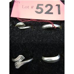 4 Sterling silver rings - estate