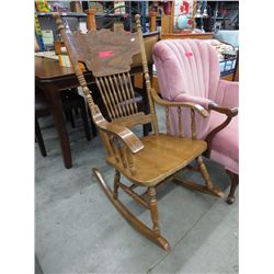 Press back oak rocking chair