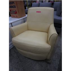 Butter yellow leather swivel chair