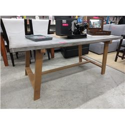 Grey top trestle style dining table